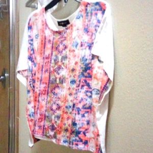 Amy byer/size L 14/the front has pink blue green tribal style; white in the back